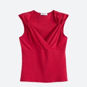 Knit top worn once. Perfect condition.